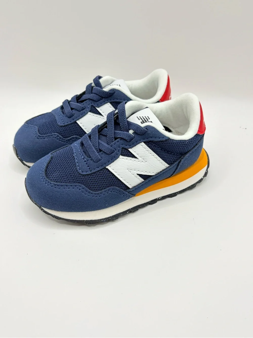 New Balance 237 Bungee Navy Kids Sneakers with White 'N' and Red Heel